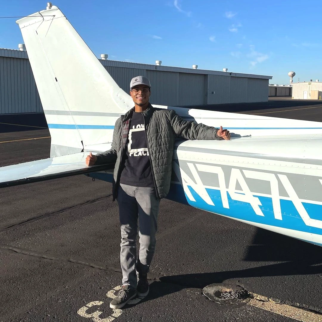 SimpliFly Flight School student and instructor doing a preflight check on a Cessna 172