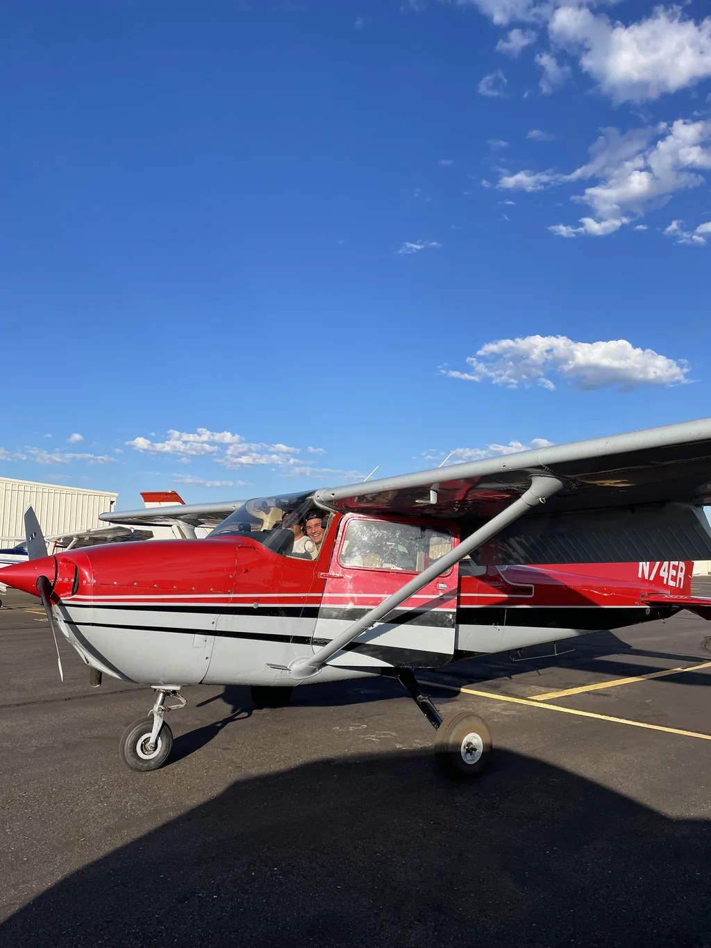 Pilots celebrating progress during professional flight training in Arizona