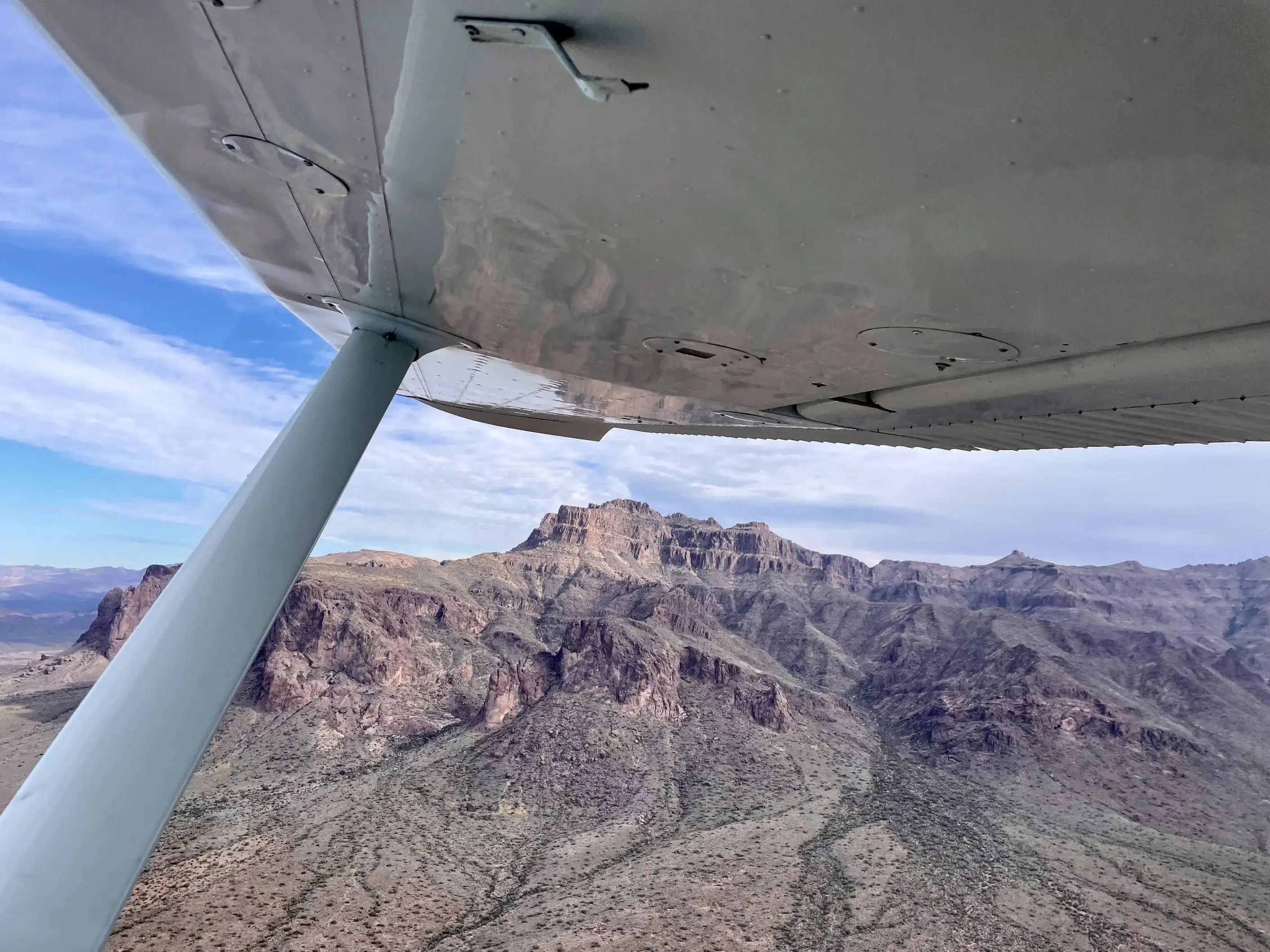 SimpliFly flight school aircraft flying over valley of the sun view from the window